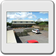 The kennels taken from the car park. All areas are fenced with the car park gate only left opened during opening hours.